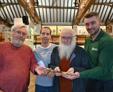 (L-R):Prof David Martill, Darren Withers, and Richard Forrest of PGPG at Rutland County Museum with Richard Gray from Heidelberg Materials