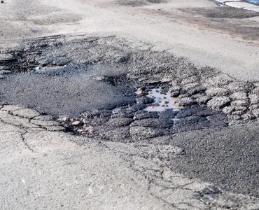 Councils in England will need to prove their progress on the pothole plague or face losing cash