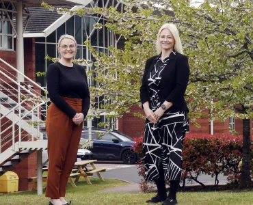 L-R: Emma Turner with Terri Charles outside the Business Innovation Centre in Binley, where Cemex have opened a new training facility and office space