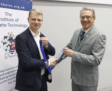 L-R: John Reddy receiving the ICT President’s chains of office from outgoing President Colin Nessfield