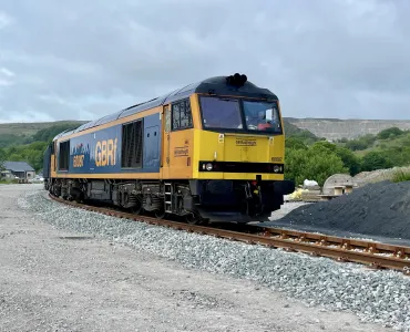 The first train leaving via the newly reinstated rail link at Horton Quarry
