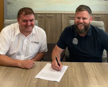 L-R: Finlay general manager and business line director Matt Dickson with Mike Maher, founder and chief executive officer of ProTrack, signing the new dealership agreement