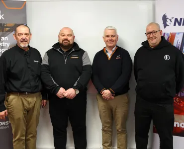 Pictured are members of HCMUK, including David Roberts, chief executive officer, and John Clare, internal trainer, alongside Andrew Hodges and Lee Chisholm from NPORS