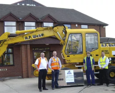 Thomas Hammond receives his prize from Chain+Conveyor