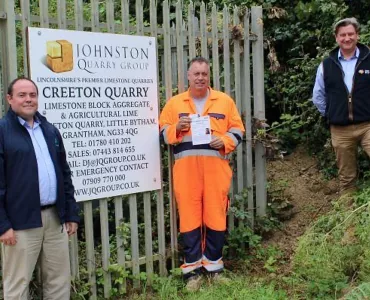 Steve Johnson of Johnston Quarry Group receiving the first OCA