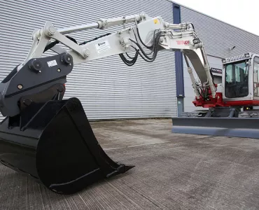 Hill Engineering quick-coupler on a Takeuchi excavator