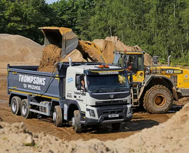 Volvo FMX truck with Thompson Loadmaster Lite bodies