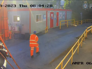 Screenshot of CCTV footage seconds before the collision. The vehicle involved is reversing in from the left-hand side of the image