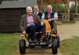 L-R: Paul Hazel and Matthew Millett from Cotswold Lakes Trust with Peter Andrew from The Hills Group in a go-kart at Cotswold Country Park & Beach in the Cotswold Water Park