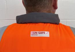 Sun-Safe Indicator applied to a new orange hi-vis garment