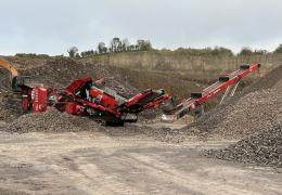 A Screencore XJ jaw crusher , Trident 124 scalper and 380DD stacker conveyor production train