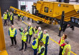 Attendees at the event being shown around Kiverco’s newly extended facilities and some of the recycling machinery on display  