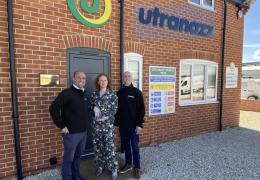 Daniel Wiseman, sales director, and commercial director Will Harris receiving the Innovation Award from Clare Howcutt-Kelly, editor of Concrete Connect