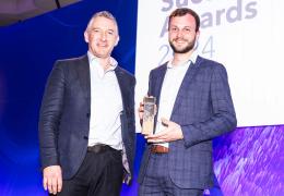 Sam Farnsworth (right) accepting the Customer Success Award for Excellence in Analytical Insights from Pete Wilkinson, managing director of Esri UK