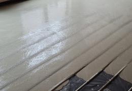 Thin layer of Cemfloor placed over an underfloor heating system