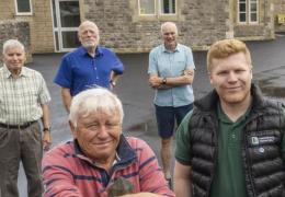 James Brown (right), unit manager at Tytherington Quarry, with members of the Tytherington village hall committee