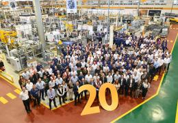 JCB Power Systems employees celebrate the company’s 20th birthday at the plant in Foston, Derbyshire