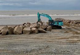Rock armour is being strategically placed to create groynes at Rossall Beach