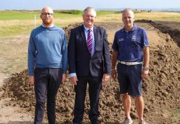 L-R: Club manager Alex Shaw with Scott Bros directors Bob Borthwick and Peter Scott following a delivery of the firm’s sustainably produced sand