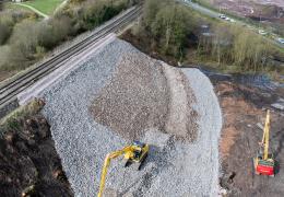 Aggregate Industries supplied 20,000 tonnes of stone from Bardon Hill Quarry to restore the Telford embankment. Image: Network Rail