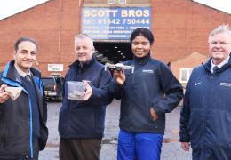 L-R: Dr Sina Rezaei Gomari, Peter Scott, KTP associate Eghe Ikponmwosa-Eweka, and Bob Borthwick with the clay that will be used in the artificial soil as well as a drone that will monitor the test site