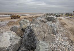 Granite armour-stone is being used to help strengthen vital sea defences at Kinmel Bay 