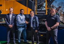 Rygor Group commercial director Rish Channa (centre left) and Chase Shim, managing director of Hyundai Construction Equipment Europe (centre right), shake hands on the appointment of Rygor Plant at the Bauma fair in Munich, with Bart van Berkel, network excellence development (left) and Anthony Hogben, regional sales manager (right)