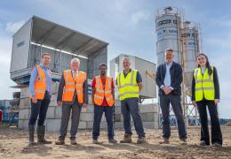 L–R: Prof. David Hughes; Bob Borthwick; Scott Bros recycling innovation engineer Feysal Shifa; Peter Scott; Joss Newberry; and Cassidy Smith, Teesside University’s IP and commercialization manager, at the low-carbon concrete plant
