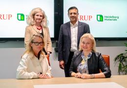 Signing of the Memorandum of Understanding between Heidelberg Materials and Arup. Seated (L-R): Dame Jo da Silva, chief sustainable development officer, Arup; and Dr Katharina Beumelburg, chief sustainability and new technologies officer, Heidelberg Materials. Standing (L-R): Jemima Bruin-Bland, carbon capture and utilization lead - UKIMEA, Arup; and Mubarik Chowdhry, vice-president of global key account and product management for evoZero, Heidelberg Materials