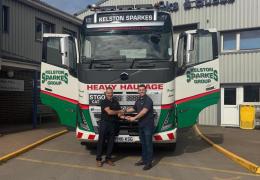 L-R: Justin Fisher handing the keys to Kelston Stark of Kelston Sparkes Group