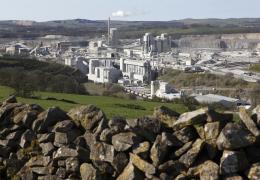 Carbon dioxide emissions generated by the UK concrete and cement sector are now 63% lower than 1990 levels