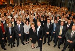Alan Blake with JCB staff