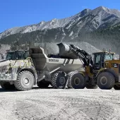 One of Jura Creek Enterprises’ new Rokbak RA40 articulated haulers working in the shadow of the Rocky Mountains at Crowsnest Pass Quarry