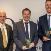 L-R: IQ Council member Steve Cole with Emerald Challenge winners Thomas Clifford, director of GEARS Ltd, and Oliver Kibble, quarry development Manager at Tarmac