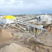 The QMS-designed and built 60m radial stacker conveyor at Heidelberg Materials UK’s Frindsbury Wharf site