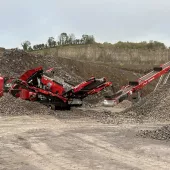 A Screencore XJ jaw crusher , Trident 124 scalper and 380DD stacker conveyor production train