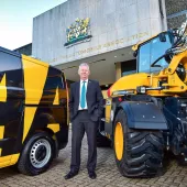 AA President Edmund King OBE pictured with an AA van and a JCB Pothole Pro outside the motoring association’s HQ in Basingstoke