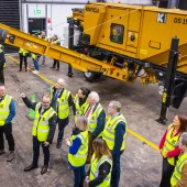 Attendees at the event being shown around Kiverco’s newly extended facilities and some of the recycling machinery on display  