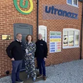 Daniel Wiseman, sales director, and commercial director Will Harris receiving the Innovation Award from Clare Howcutt-Kelly, editor of Concrete Connect