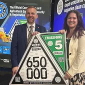 L-R: Steven Mulholland, chief executive officer of the CPA (Construction Plant Hire Association), and Beth Abbott, marketing and communications manager with the CEA, celebrating CESAR’s 650,000th registration milestone