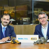 L-R: Anil Jhanji, chief commercial officer of Tata Steel UK, signing the MoU with Wayne Asprey, group purchasing director at JCB