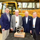 L-R: Sellick Equipment president Colin Sellick, Sellick Equipment co-founder Howard Sellick, JCB chairman Anthony Bamford, and Sellick Equipment co-founder David Sellick 