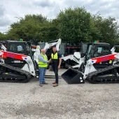 L-R: Malcolm Gough, national hire manager at H.E. Services, and Graham Deacon, national and key accounts sales manager for Doosan Bobcat for the UK and Ireland, with some of the new T76 tracked loaders