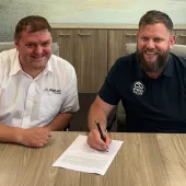 L-R: Finlay general manager and business line director Matt Dickson with Mike Maher, founder and chief executive officer of ProTrack, signing the new dealership agreement