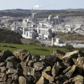 Carbon dioxide emissions generated by the UK concrete and cement sector are now 63% lower than 1990 levels