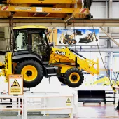 A JCB backhoe comes off the production line 