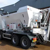 A volumetric concrete mixer truck