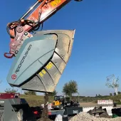 Rockcrusher bucket attachment