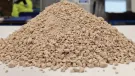 Analcime sand generated as a side stream in lithium extraction can be utilized as gravel and binder in materials for low-carbon concrete production