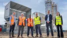 L–R: Prof. David Hughes; Bob Borthwick; Scott Bros recycling innovation engineer Feysal Shifa; Peter Scott; Joss Newberry; and Cassidy Smith, Teesside University’s IP and commercialization manager, at the low-carbon concrete plant